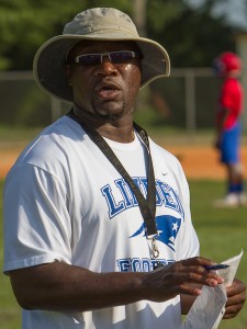 Linden head coach calls out players' names for drills during preseason practice.