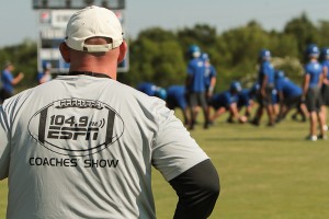 Demopolis head coach Tom Causey watches practice from the sidelines.