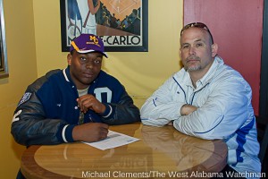 Kessy Bell, with Coach Tom Causey at Batter Up! Sports Grill, signed a National Letter of Intent to play collegiate football for the Miles College Golden Bears.
