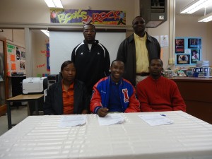 Anthony Robinson Jr. signed with UWA Wednesday. He is flanked by his parents Serlena Robinson and Anthony Robinson Sr. The family is joined by Linden head coach Andro Williams and principal Dr. Timothy Thurman. 