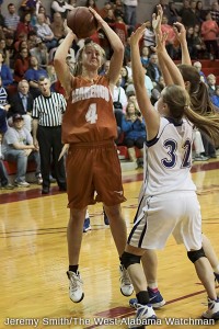 Andrea Edmonds drops in a fallaway jumper Thursday night during Marengo Academy's state title game loss to Lakeside. 