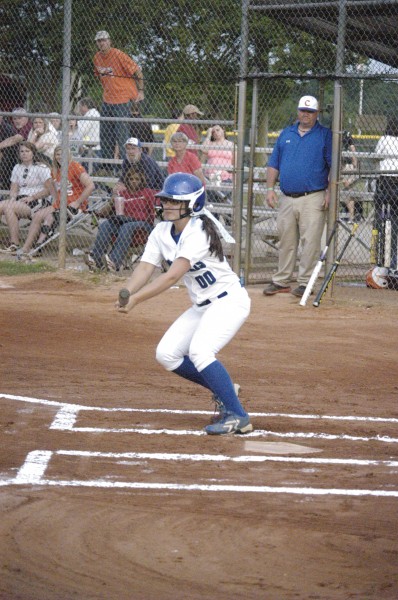 Victoria Washburn drops down the first hit of the game against Chilton County Friday evening.