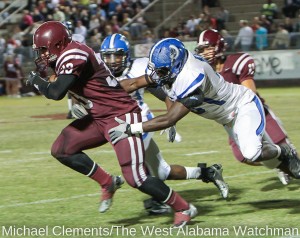 Tyler Merriweather makes a tackle for Demopolis during the 2012 season.