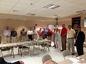 Former Demopolis Rotary Club presidents line the walls Wednesday afternoon for the ceremonial passing of the gavel.