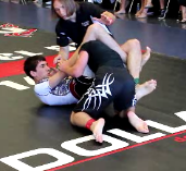 Ross MA student Tristen Fitz-Gerald sinks in a triangle choke to win the no gi title at the NAGA Georgia State Championships.