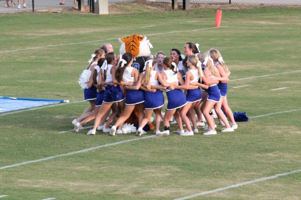 The Demopolis High varsity cheerleaders warming up before the Jamboree game against Sweet Water.