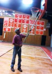 MA Board of Directors member Kevin Dixon helps spruce up the gym.