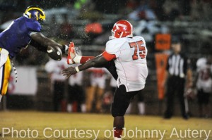Demarcus Gamble breaks through and blocks a South Choctaw punt.