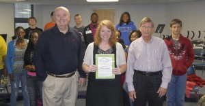 John Northcutt, President of the Foundation and Kim Townsend, Vice President of the Foundation present Heather Kennedy with a Fall 2013 Classroom Grant for the new choral program at Demopolis High School.