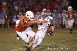 (Photo courtesy Raycelia McIntyre) Cason Cook makes a tackle for Marengo Academy.