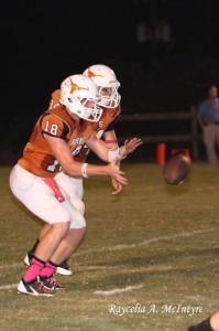 (Photo courtesy Raycelia McIntyre) Hayden Huckabee takes a snap Friday against PIckens. The sophomore eclipsed 100 yards rushing for the Longhorns. 