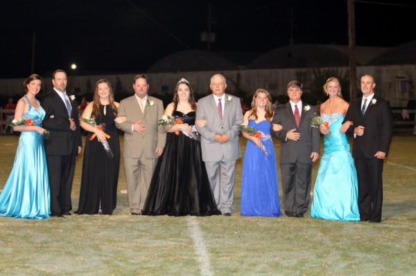 The 2013 Homecoming Queen and court....Sophomore maid Natalie Parker. Natalie is the daughter of Heather Parker and the late Gena Pugh Parker. Senior maid Conner Etheridge. Conner is the daughter of Brett and Barbara Etheridge. Queen Nicole Parten. Nicole is the daughter of Greg and Kathy Parten. Senior maid Chandler Stenz. Chandler is the daughter of Danny and Pam Stenz. Junior maid Andrea Edmonds. Andrea is the daughter of Duane and Robin Edmonds.