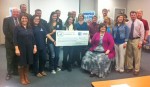 Educators, Board of Education members, students and city leaders gathered for Monday evening's check presentation.