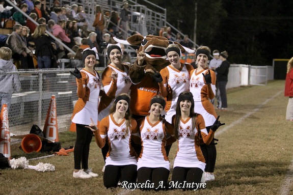 Louie Longhorn poses with the cheerleaders at the first round of the AISA playoffs as Marengo Academy hosted Chambers Academy last Thursday. Pictured are (front) Haley Mitchell, Kimberly Moore, Anna Michael Crocker; (back) Amber Ray, Nicole Parten, Louie (Dunford Cole), Natalie Long, Ryan Hale. 