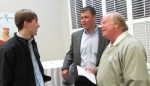 New Chamber Executive Director Michael Kennedy talks with Demopolis business leaders Charles Singleton and Dan Wilson.