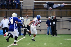 (Photo courtesy Rivercat Photography)  Demopolis High senior Demetrius Kemp heads toward the end zone after hauling in a pass for the Alabama High School Football All-Star Team Saturday in the Alabama-Mississippi All-Star Classic.