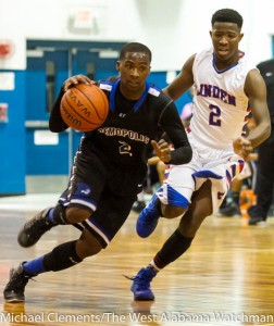 DHS' Roderick Davis brings the ball up court against Linden.