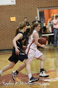 Chandler Stenz drives around the Patrician defense en route to a Lady Longhorn state championship earlier this year. Stenz will continue her playing career at Huntingdon College.