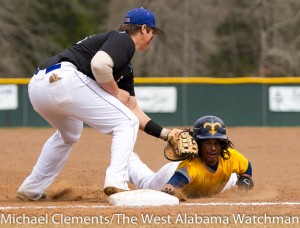 Jacob Rodrigues completes a pick-off of a Selma runner.