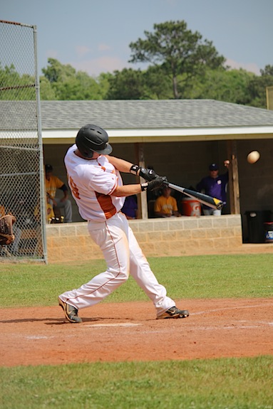 (Photo by Collin Sheffield)  Brant Lewis strokes a homer during game one Thursday.