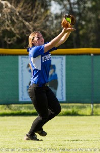 Julia Veres hauls in a flyball.