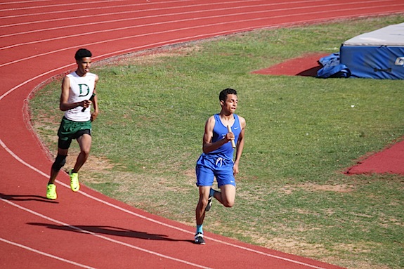 D.J. Fultz running the third leg of the boys' 4x800-meter relay which placed second in the meet. D.J. also won the boys' individual 800-meter.
