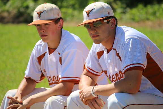 Carson Huckabee and Robert Tutt look on during Friday's action.