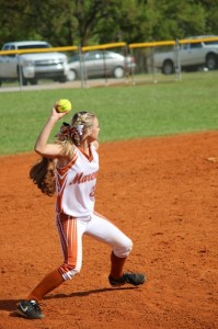 Brittany Davis throws out a runner against Autauga Academy in a junior varsity game Saturday.