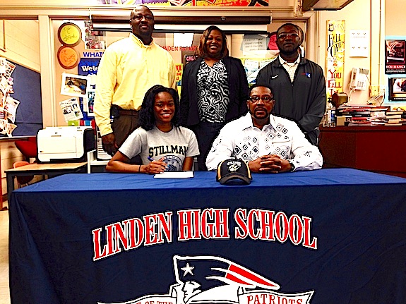 Stillman College signee Alexis Johnson is pictured with her father, Joe Johnson, Linden High principal Dr. Timothy Thurman, Linden girls basketball coach Teressa Bolden and Linden athletic director Andro Williams.