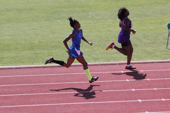 Tameria Aldridge competes in the 4x400 relay.