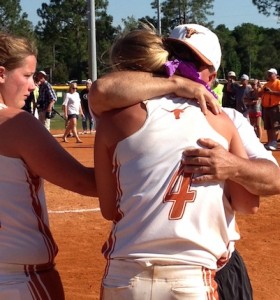 Marengo Academy coach Danny Stenz hugs Andrea Edmonds after the Lady Longhorns finished as state runner-up in the 2014 season. Stenz is the West Alabama Watchman softball Coach of the Year while Edmonds won Player of the Year honors.