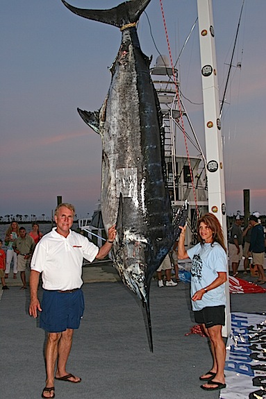 (By David Rainer) Deb Hebert and Joe Hudson, owner of the Iona Louise out of Montgomery, are dwarfed by the 843.7-pound blue marlin that Hebert boated after a three-hour-plus battle during the Mississippi Gulf Coast Billfish Classic. It is the largest blue marlin landed by a female angler in the tournament’s 18-year history. The second-place boat in the blue marlin category was also from Alabama. Patience, an Orange Beach boat, weighed in a 680.1-pounder that was caught by Andy Ryan, left, as Parker Huddle captained the boat. The crew of Blue Smoker, another Orange Beach boat, celebrates the winning 173.3-pound yellowfin tuna.