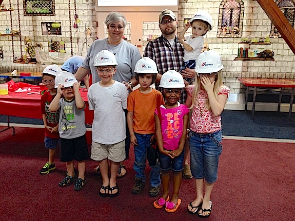The Demopolis Public Library gave away six hardhats and six sets of safety glasses courtesy of Cemex during the Wednesday session of its Fizz, Boom, Read summer reading program. 