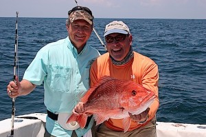 Red snapper anglers will have four weekends in July to catch their favorite fish. Conservation Commissioner. N. Gunter Guy Jr., and Conservation Advisory Board member Joey Dobbs show off a nice snapper caught on the Lady Ann out of Dauphin Island.