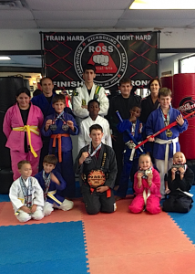 Members of the Ross Martial Arts junior BJJ team pose with awards they won at the Georgia state championships in Atlanta. Pictured are (left to right): First row - Dylan Russell, Braden Morgan, Brett Schroeder, Joanna Duke, Charlie Duke; Second row - Bebe Ellis, Collin Morgan, Milan Wallace, Dyllon Williams, Will Cork; Back row - Jay Russell, Tristen Fitz-Gerald, Hunter Compton, and Ronda Russell. Not pictured:  Austin Wright.