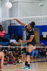 Ivery Moore goes up for a kill against Wilcox County High School.