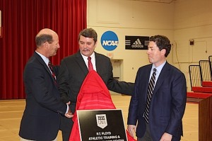 UWA dedicated the R.T. Floyd Athletic Training and Sports Medicine Center on campus with a ceremony and tour of the new facility. The facility's namesake, Dr. R.T. Floyd, center, is congratulated by Brad Montgomery, head athletic trainer for UWA, at left, and Dr. E. Lyle Cain, orthopedic surgeon for Andrews Sports Medicine & Orthopaedic Center of Birmingham, at right.