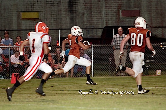 (Photo by Raycelia McIntyre) Ralph Langley sprints into the end zone for a touchdown.