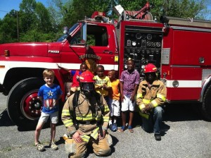 Jefferson Volunteer Firefighters Dave Compton (left) and Bobby Lynch (right) participated in AME Zion Church's Youth Day earlier this summer to discuss fire safety and prevention.