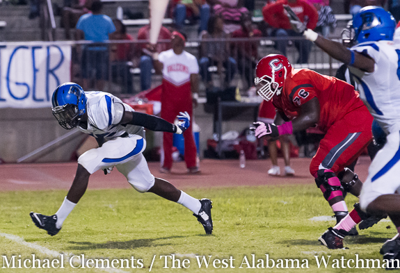 Tim Bonner (left) blows past Alabama offensive line signee Lester Cotton (76) when Demopolis took on Central-Tuscaloosa during the 2014 season.