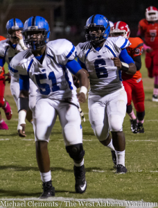 Jayjerrin Craig (6) follows the blocking of Travares Hall (51) in route to a touchdown against Central Tuscaloosa.