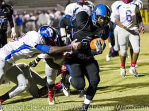 Rashad Lynch breaks a tackle as he scores a touchdown against Wilcox Central.