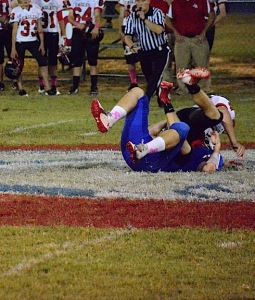 Blake Jowers makes a tackle for Jackson.