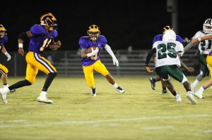 R.J. Rodgers breaks into the open during a run Friday night against Flomaton.