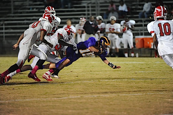 SW QB Branson Davis (10) dives to pick up extra yards in Friday's game with Southern Choctaw.