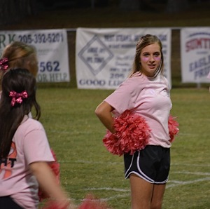 Sumter cheerleader Mary Harmon Patrenos and the varsity cheer squad observed Pink Out as part of Breast Cancer Awareness month.