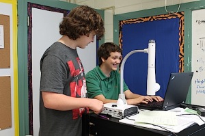 Taylor Hurt and Alexander Saliba working on the website for the Demopolis Middle School robotics team. DMS ranked 46th out of 458 Alabama middle schools in the 2015 Niche rankings.
