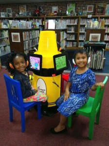 Mackenzie Banks and D’Miya Hawkins were the first library patrons to use the new iPads.