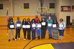 The 10 LHS seniors who have been awarded a total of $208,000 in Alabama A&M University scholarships are (l-r) Dewayne Charleston, Jr., Quinten Richardson, Brija Brown, Krisshandra Fluker, Oriana Little, Amanda Evans, Elizabeth Dunn, Kelvin Roulaine, Adriauna Alston, and Lynneshia Dukes. Their principal Dr. Timothy Thurman was on hand at the ceremony to celebrate their success. 