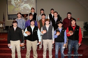The senior football players were given their jersey as a memento of their football days at Marengo Academy. Pictured are:  (front) Wallace Tutt, Tait Sanford, Sam Renner, Myles Pritchett, Ralph Langley, (middle) Carson Huckabee, Josh Holifield, Hayden Hall, Kyle Friday, Dalton Etheridge, (back) Alston Dinning, Tyler Barkley, Will Allen. Not pictured are Chad Beverly and Shade Pritchett. The jerseys were presented by their coaches, Coach Robby James and Coach Webb Tutt. 